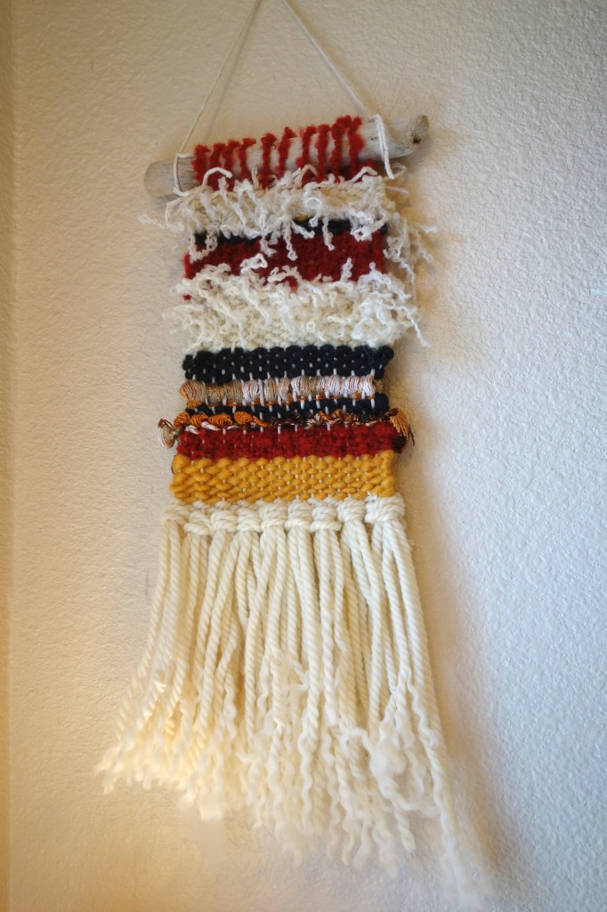 Another photo showing long tassels hanging from the tapestry.