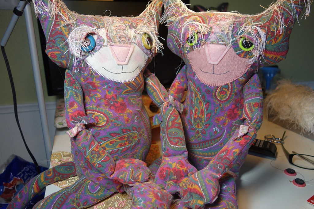 Ginger poses with her cousin, a new cat doll, made out of the same 60's vintage fabric as Ginger.