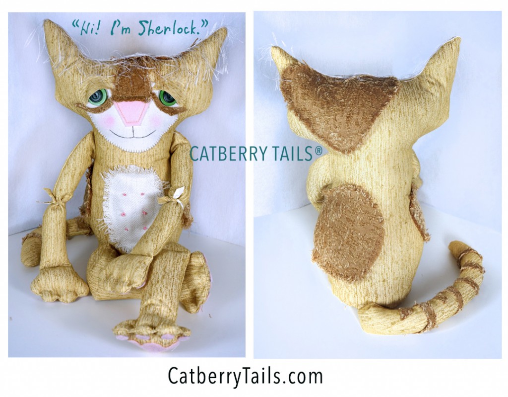 Adorable soft sculptured cat named Sherlock. He is gold color with soft butterscotch color patches. His tail is striped.