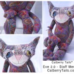 Soft Sculpture cat doll made of paisley fabric. This is staff member Eve Two Point Oh.